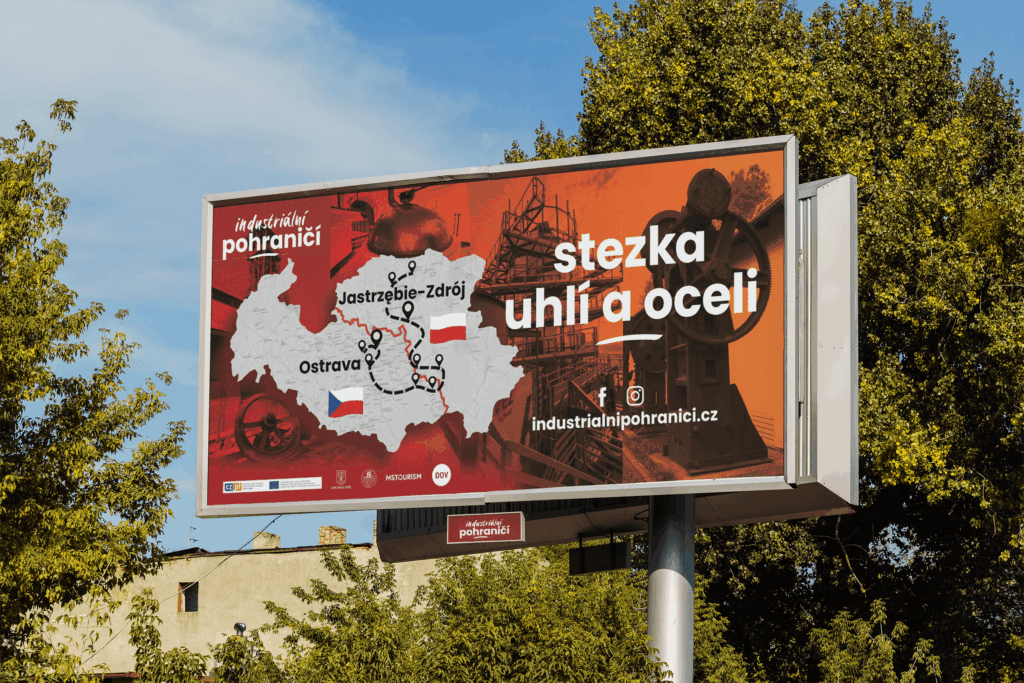 Česká verze billboardu propagující projekt spojující industriální památky v Moravskoslezském kraji a Slezském vojvodství.